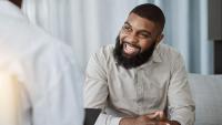 Man smiling in doctor's office